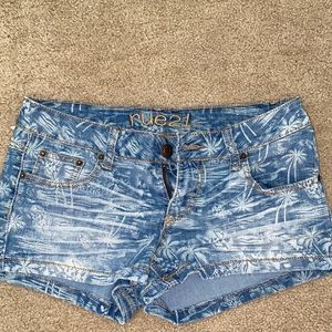 Palm tree print denim shorts